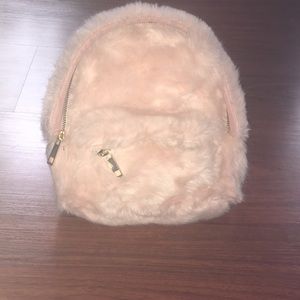 Mini light pink fuzzy backpack